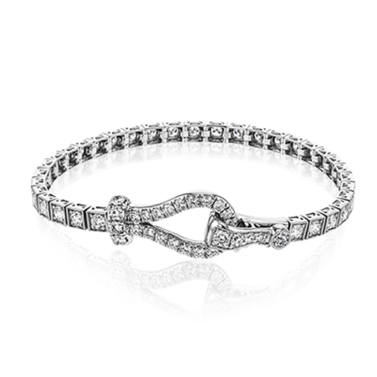 Women’s classic cuff bracelets-This remarkable buckle bracelet contains a whopping 3.00 ctw of white diamonds, topped off with a charming, well-made buckle clasp.