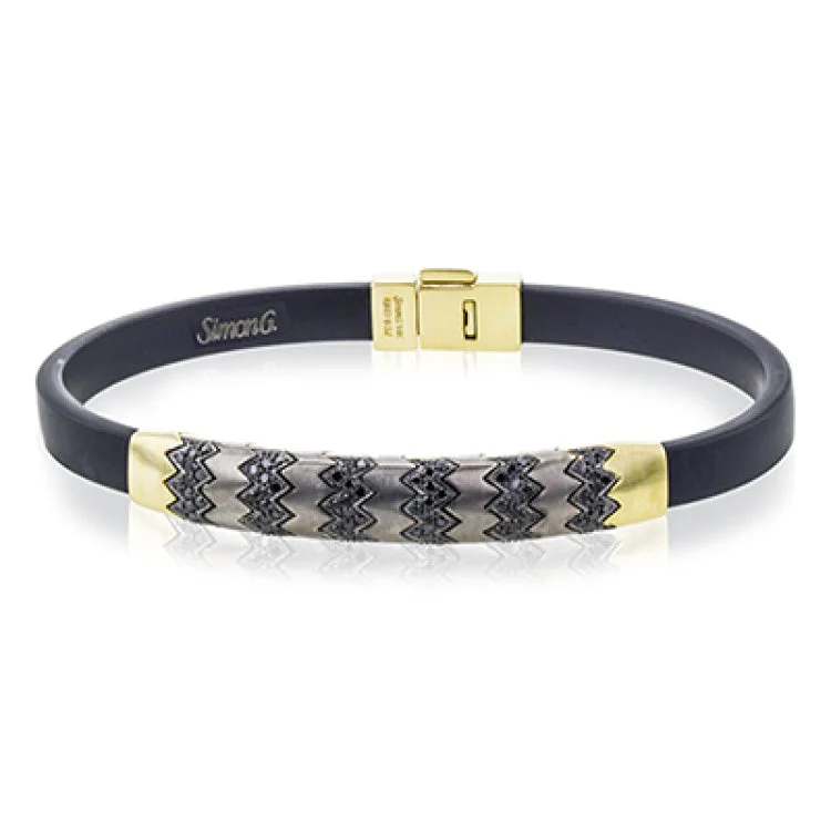 Women’s custom bracelets-This men's bracelet features a pattern made from 14k yellow gold and titanium set with .57 ctw of black diamonds.