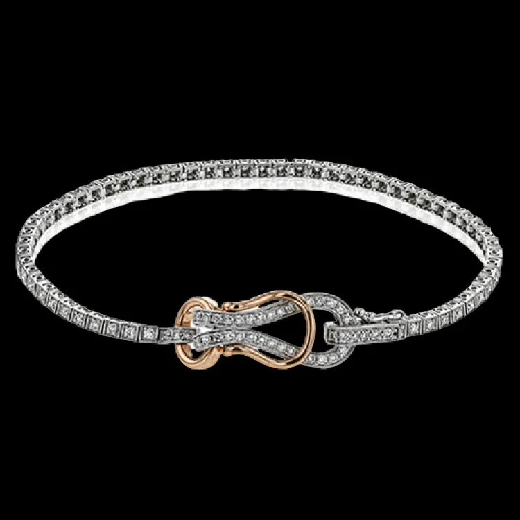 Women’s crystal bangles-This distinctive white and rose gold buckle clasp bracelet contains a remarkable 1.00 ctw of white diamonds.