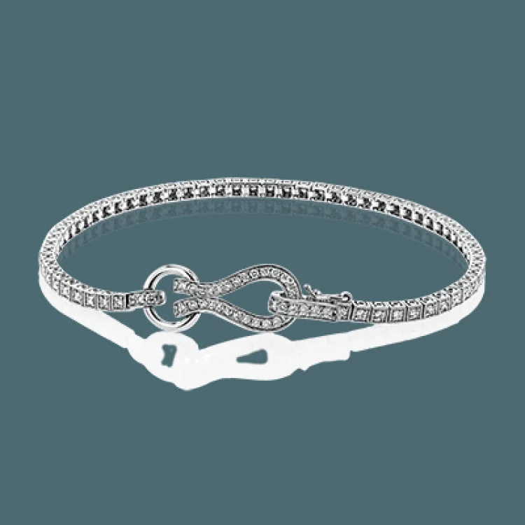 Women’s floral bracelets-This lovely buckle bracelet contains a total of 1.00 ctw of white diamonds sparkling in its midst, and a durable buckle clasp design.