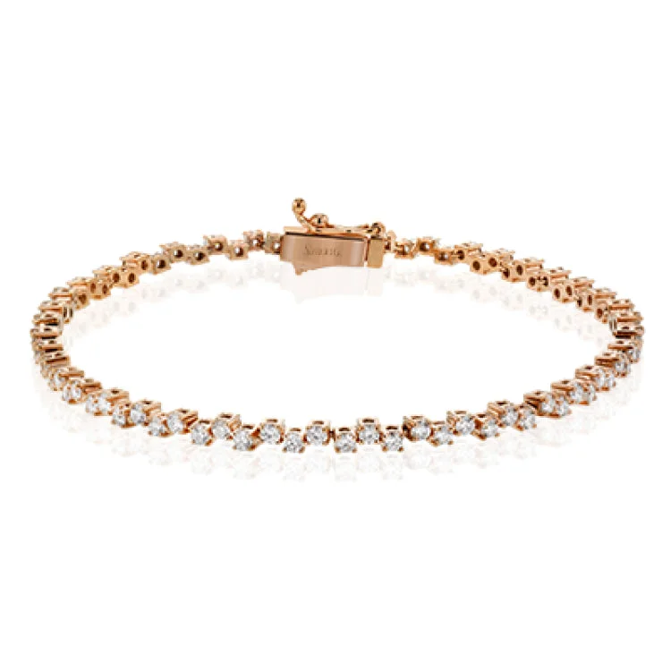 Women’s adjustable bracelets-This lovely 18k rose gold bracelet adds the ideal touch of sparkle and shine to any outfit with 2.00 ctw of white diamonds.