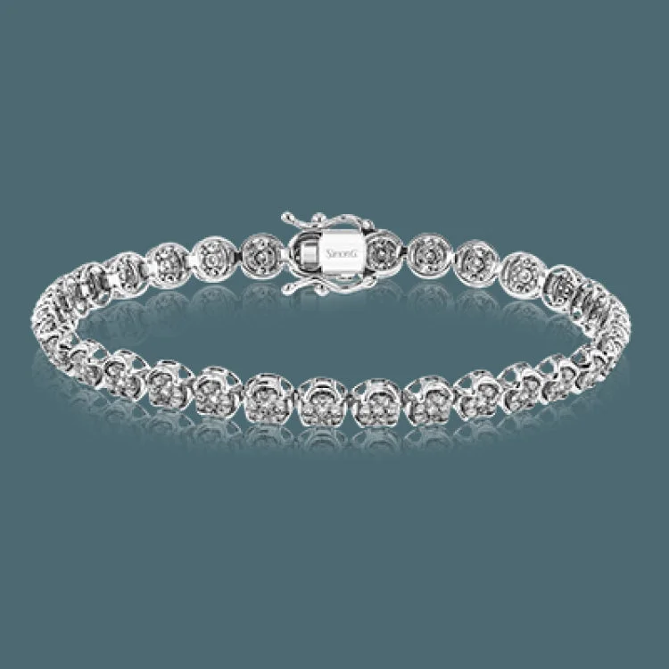 Women’s boho bracelets-Simple yet dramatic, this white gold bracelet catches eyes with its 1.51 ctw of white diamonds