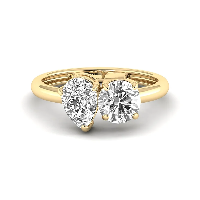 Women’s engagement rings with moissanite-3 Carat Tw Round And Pear Shape Lab Grown Diamond Ring In 14K Yellow Gold