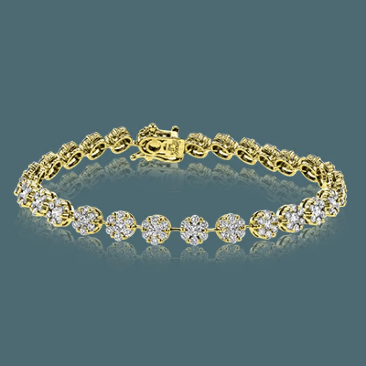 Women’s custom bracelets-This glamorous bracelet dazzles with an incredible 3.78 ctw of round white diamonds in a white gold setting