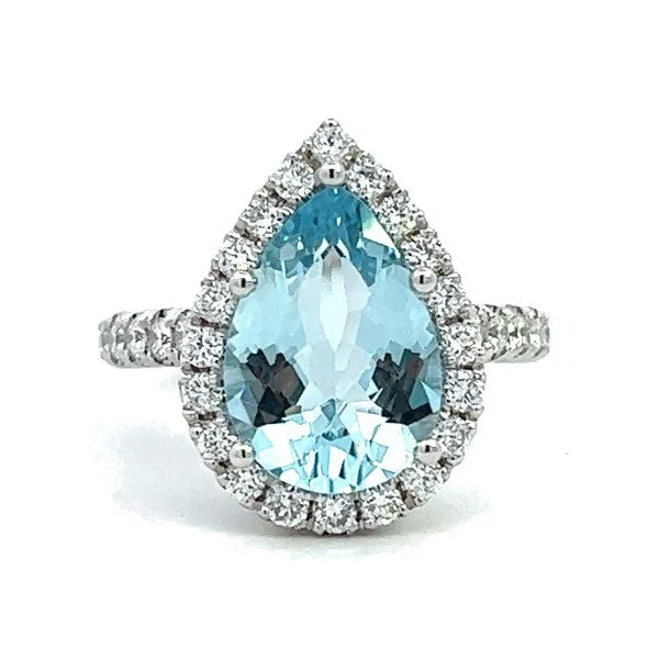 Women’s gold solitaire engagement rings-Aquamarine and Diamond Ring