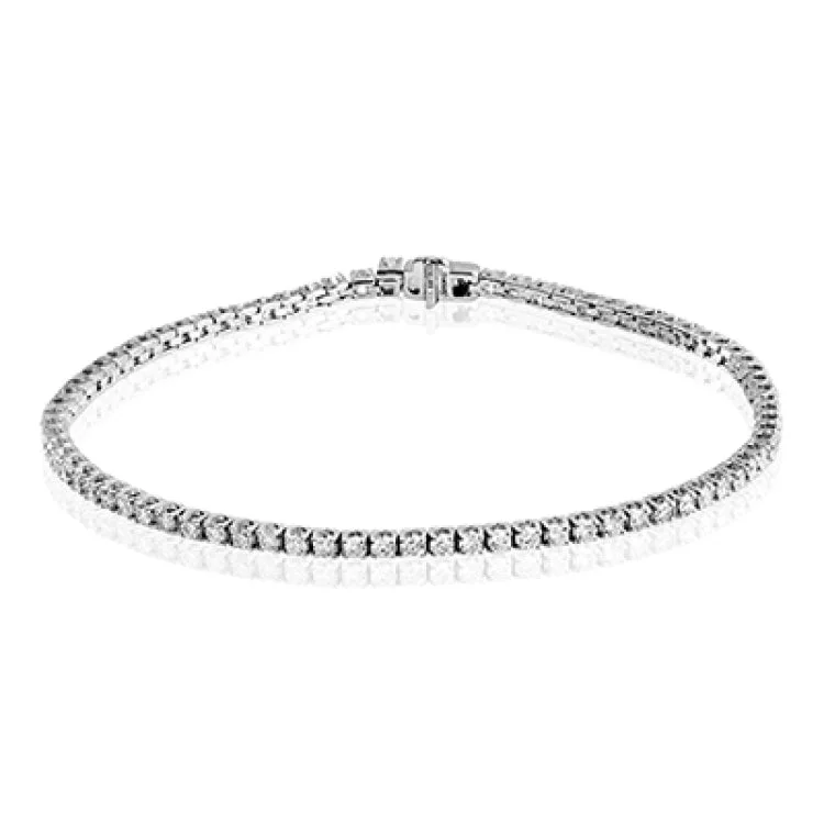 Women’s floral bracelets-This 18k gold style is a refined take on a classic tennis bracelet, with 2.00 ctw of white diamonds shining brightly.