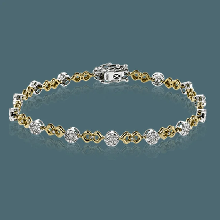 Women’s stretch bracelets-This unique bracelet shows off a total 1.15 ctw of round white diamonds in white gold settings accented by charming rose gold details