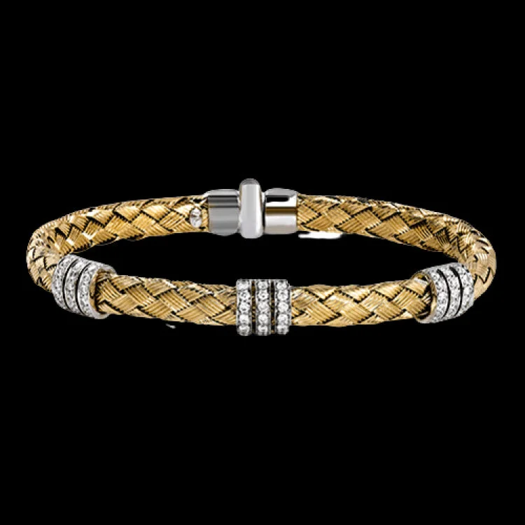 Women’s adjustable bracelets-With a 18k yellow gold woven design, this bracelet is truly stunning with .73 ctw of shining white round brilliant diamonds. Perfect for stacking.